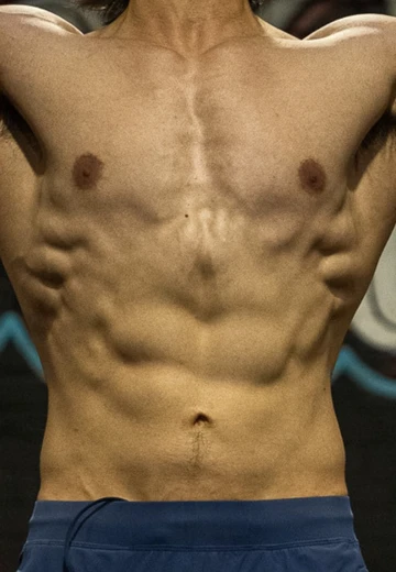 Face-cropped client progress photo, after.